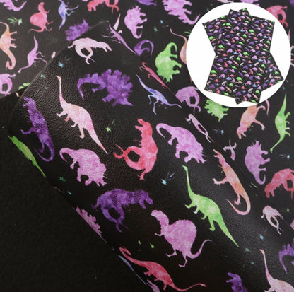 Multi-color Dinosaur on Black faux leather sheets great for bows and earrings TheFabricDude