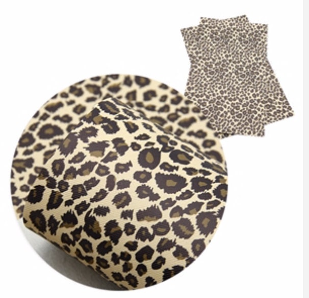 Leopard/Cheetah with yellowish background faux leather sheets and rolls great for bows and earrings TheFabricDude