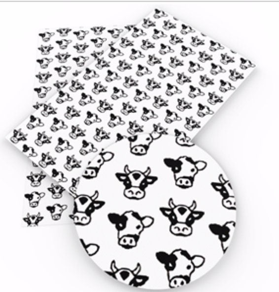 Cow Face print faux leather sheets great for bows and earrings TheFabricDude