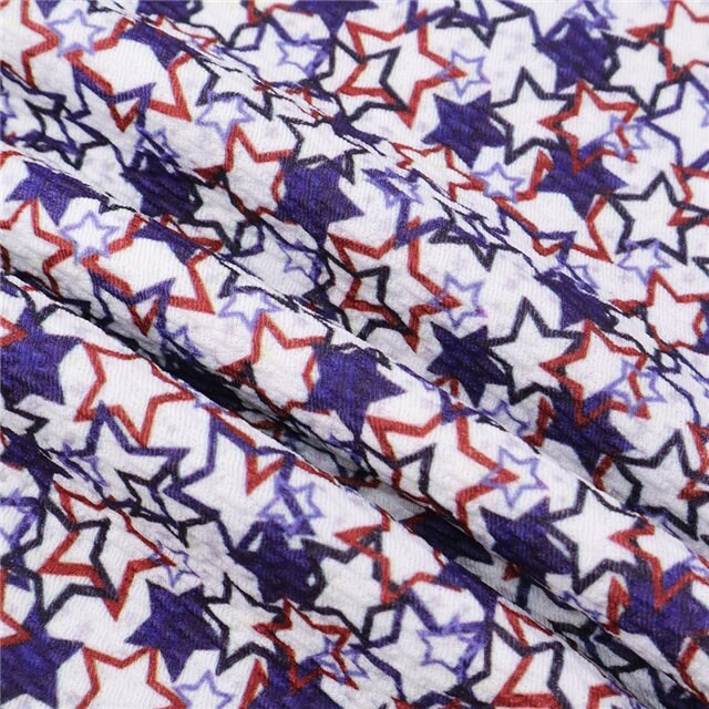 Patriotic Red and Blue Stars Print Textured Bullet Liverpool Fabric TheFabricDude