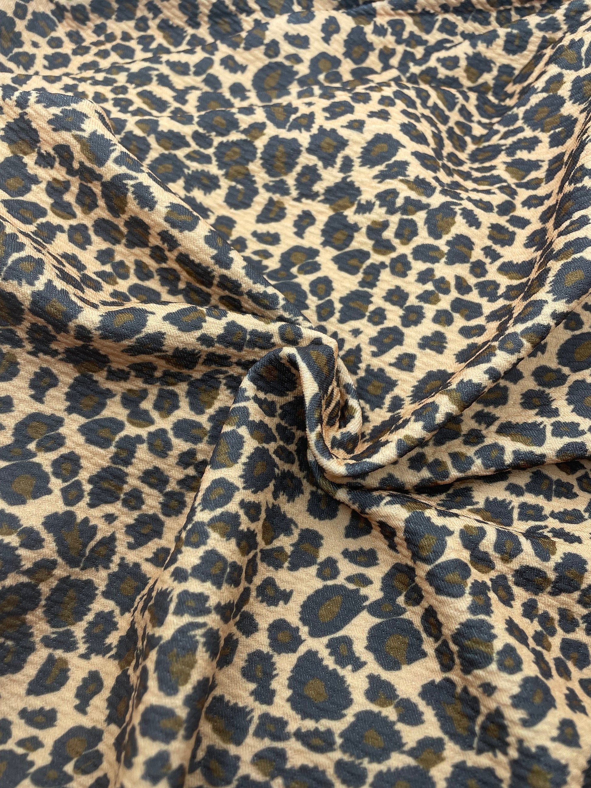 Cheetah/Leopard Print Textured Bullet Liverpool Fabric TheFabricDude